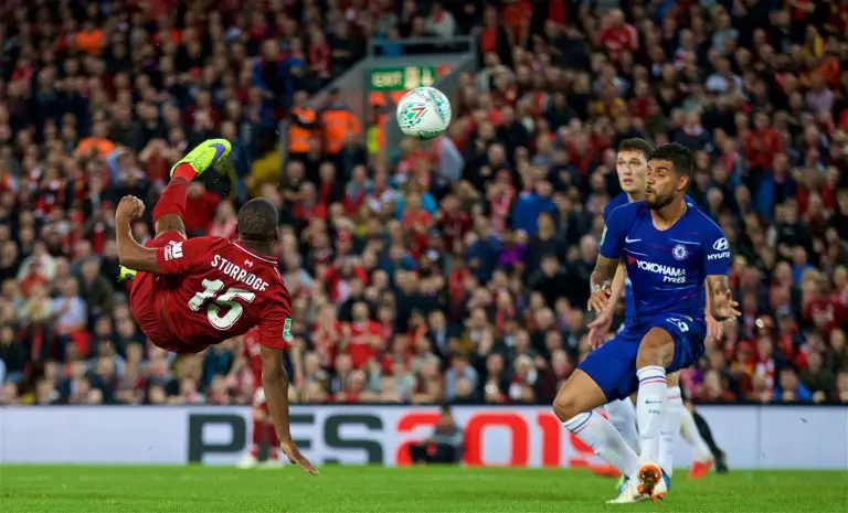 Daniel Sturridge of Liverpool scores against Chelsea