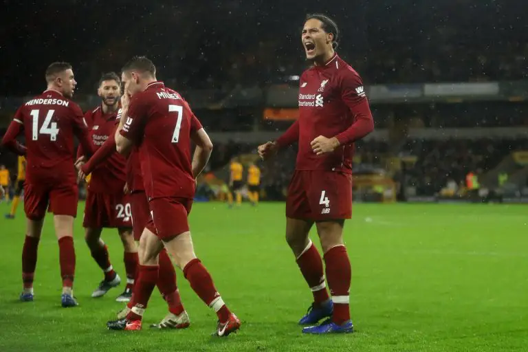 Liverpool players celebrate a goal