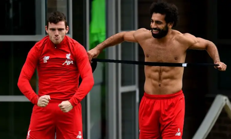 Andy Robertson with Liverpool's Mohamed Salah in training.