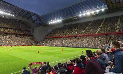 With Liverpool on pre-season tour, Anfield Road End expansion sees installation of 300-foot truss.