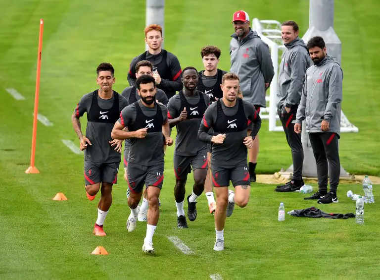 Jordan Henderson leads Liverpool training (Twitter/LFC)