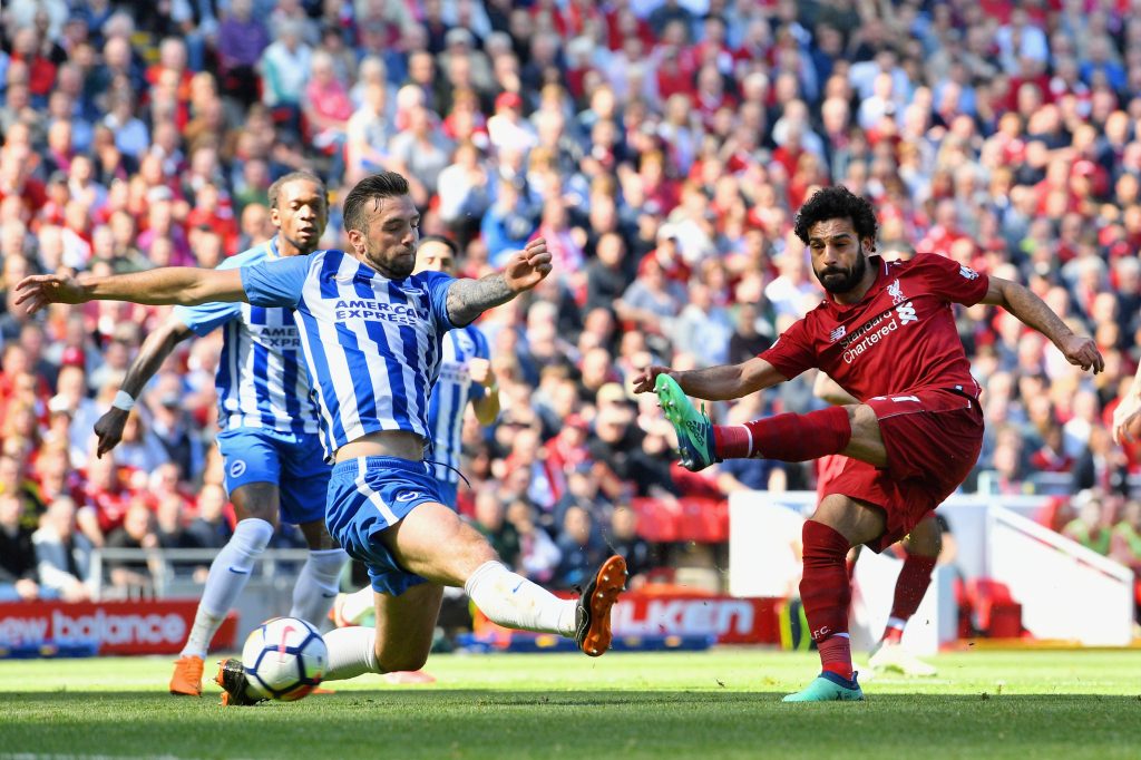 LIVERPOOL, ENGLAND - MAY 13: Mohamed Salah of Liverpool scores his sides first goal during the Premier League match between Liverpool and Brighton and Hove Albion at Anfield on May 13, 2018 in Liverpool, England. (Photo by Michael Regan/Getty Images)