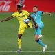 VILLAREAL, SPAIN - JULY 05: Samuel Chukwueze of Villarreal and Jordi Alba of Barcelona during the Liga match between Villarreal CF and FC Barcelona at Estadio de la Ceramica on July 05, 2020 in Villareal, Spain. (Photo by Alex Caparros/Getty Images)
