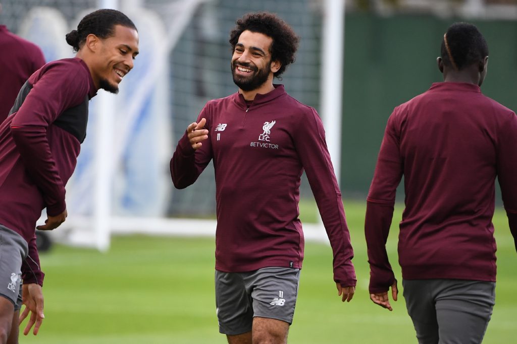 Liverpool's Egyptian midfielder Mohamed Salah (C), Liverpool's Dutch defender Virgil van Dijk (L) and Liverpool's Senegalese striker Sadio Mane attend a team training session at their Melwood training complex in Liverpool, north west England, on September 17, 2018, on the eve of their UEFA Champions League group C football match against Paris Saint-Germain. (Photo by Paul ELLIS / AFP) (Photo credit should read PAUL ELLIS/AFP via Getty Images)