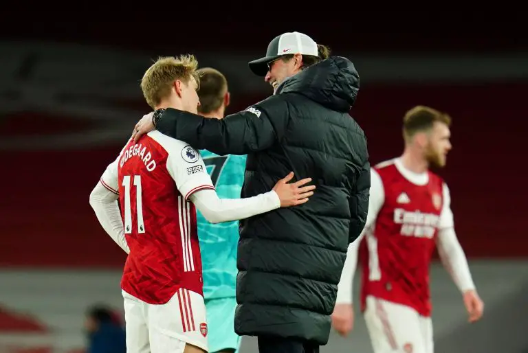 Martin Odegaard of Arsenal with Liverpool manager, Jurgen Klopp. (Photo by Javier Garcia/BPI/Shutterstock)