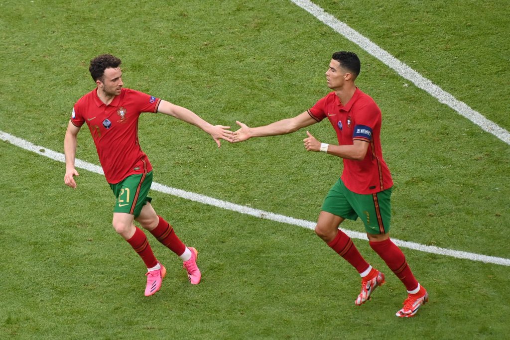 Liverpool star, Diogo Jota, celebrates with Cristiano Ronaldo after scoring for Portugal vs Germany at Euros 2020.