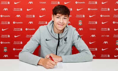 Luke Chambers signs his first professional contract with Liverpool left-back.