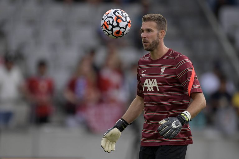 Liverpool omit veteran goalkeeper Adrian from their Europa League squad.