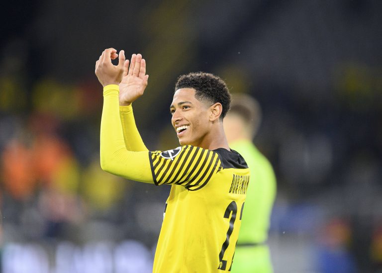 Liverpool target Jude Bellingham applauds Borussia Dortmund fans.