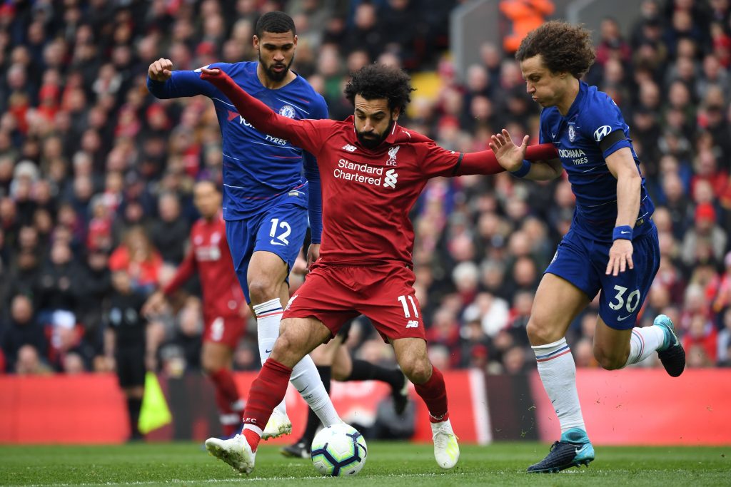 Mohamed Salah vies for the ball with Chelsea star David Luiz, as Ruben Loftus-Cheek watches in the background. (PAUL ELLIS/AFP via Getty Images)