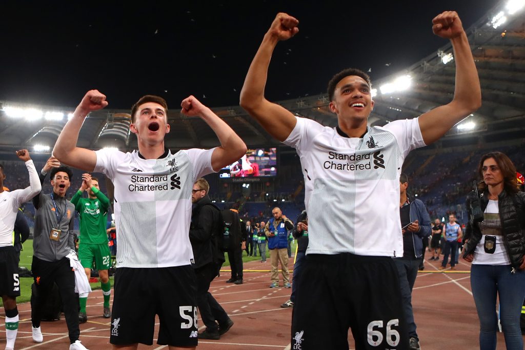 Trent Alexander-Arnold (R) and Ben Woodburn of Liverpool celebrate after the win against AS Roma.