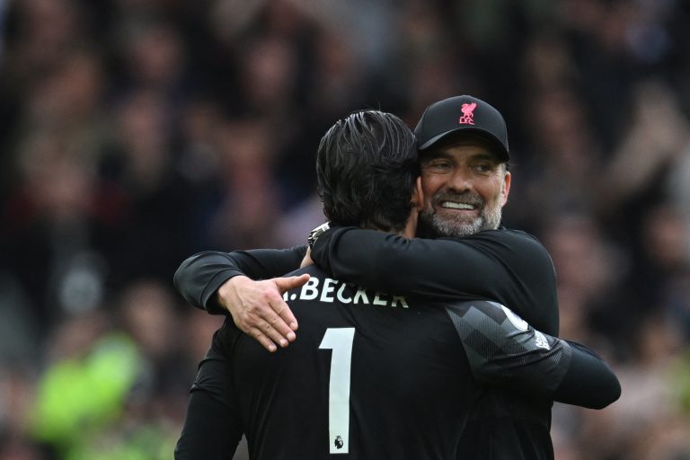 Jurgen Klopp with 2022/23 Golden Glove winner, Alisson Becker. (Photo by PAUL ELLIS/AFP via Getty Images)