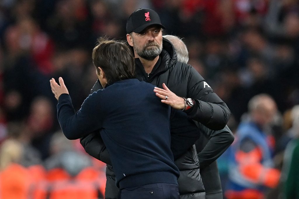 Antonio Conte of Tottenham Hotspur embraces Jurgen Klopp of Liverpool after the 1-1 draw at Anfield in May 2022. (Photo by PAUL ELLIS/AFP via Getty Images)