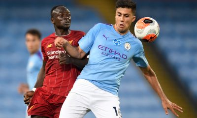 Rodri of Manchester City in action against Liverpool. (Photo by PETER POWELL/POOL/AFP via Getty Images)