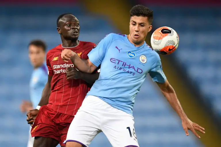 Rodri of Manchester City in action against Liverpool. (Photo by PETER POWELL/POOL/AFP via Getty Images)