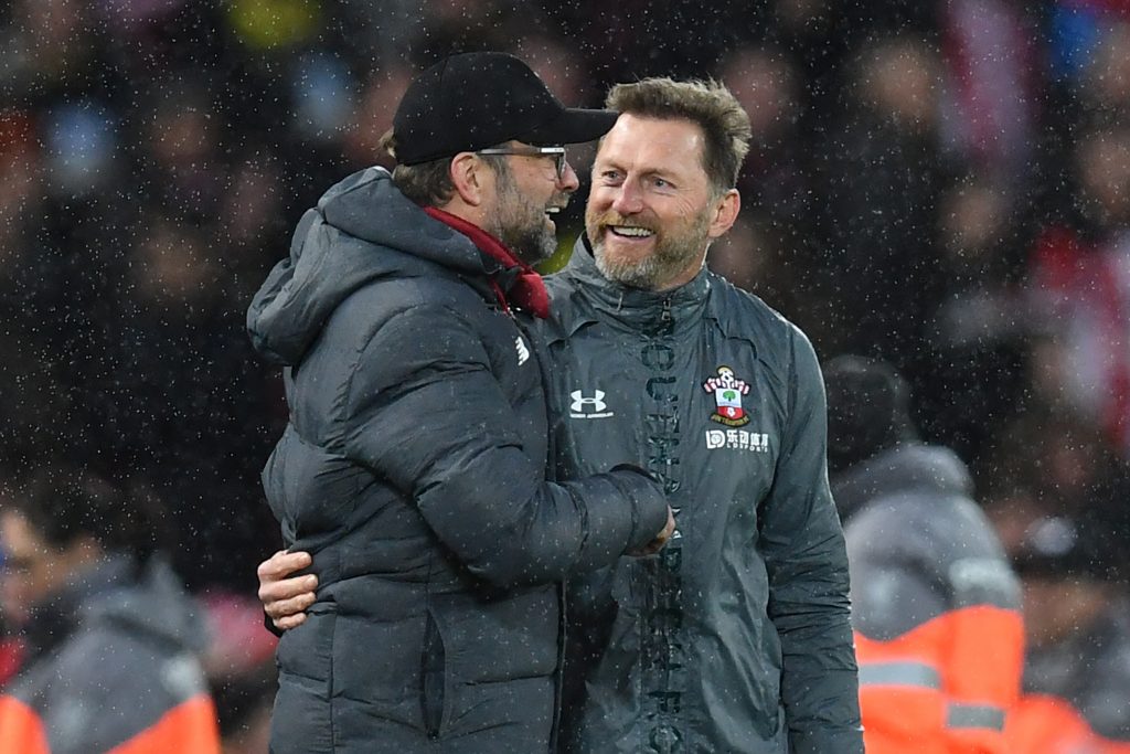 Jurgen Klopp and Ralph Hasenhuttl react on the sidelines. (Photo by PAUL ELLIS/AFP via Getty Images)