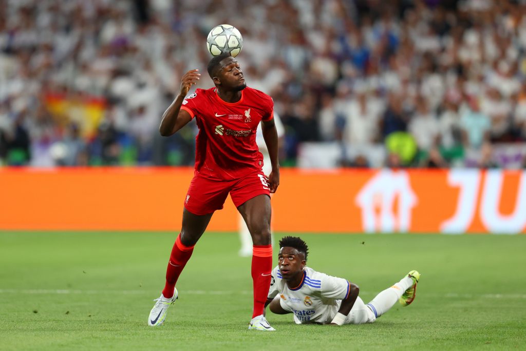 Ibrahima Konate of Liverpool is challenged by Vinicius Junior of Real Madrid during the UEFA Champions League final.