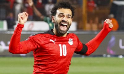 Mohamed Salah celebrates a goal for Egypt against Sadio Mane's Senegal.