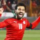 Mohamed Salah celebrates a goal for Egypt against Sadio Mane's Senegal.