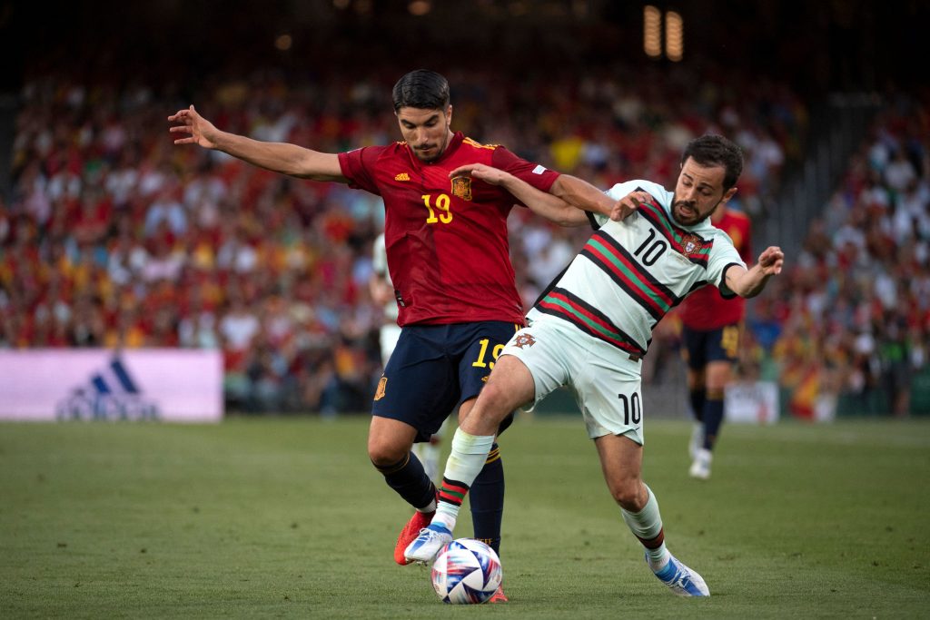 Carlos Soler views with Manchester City and Portugal star Bernardo Silva during the UEFA Nations League game