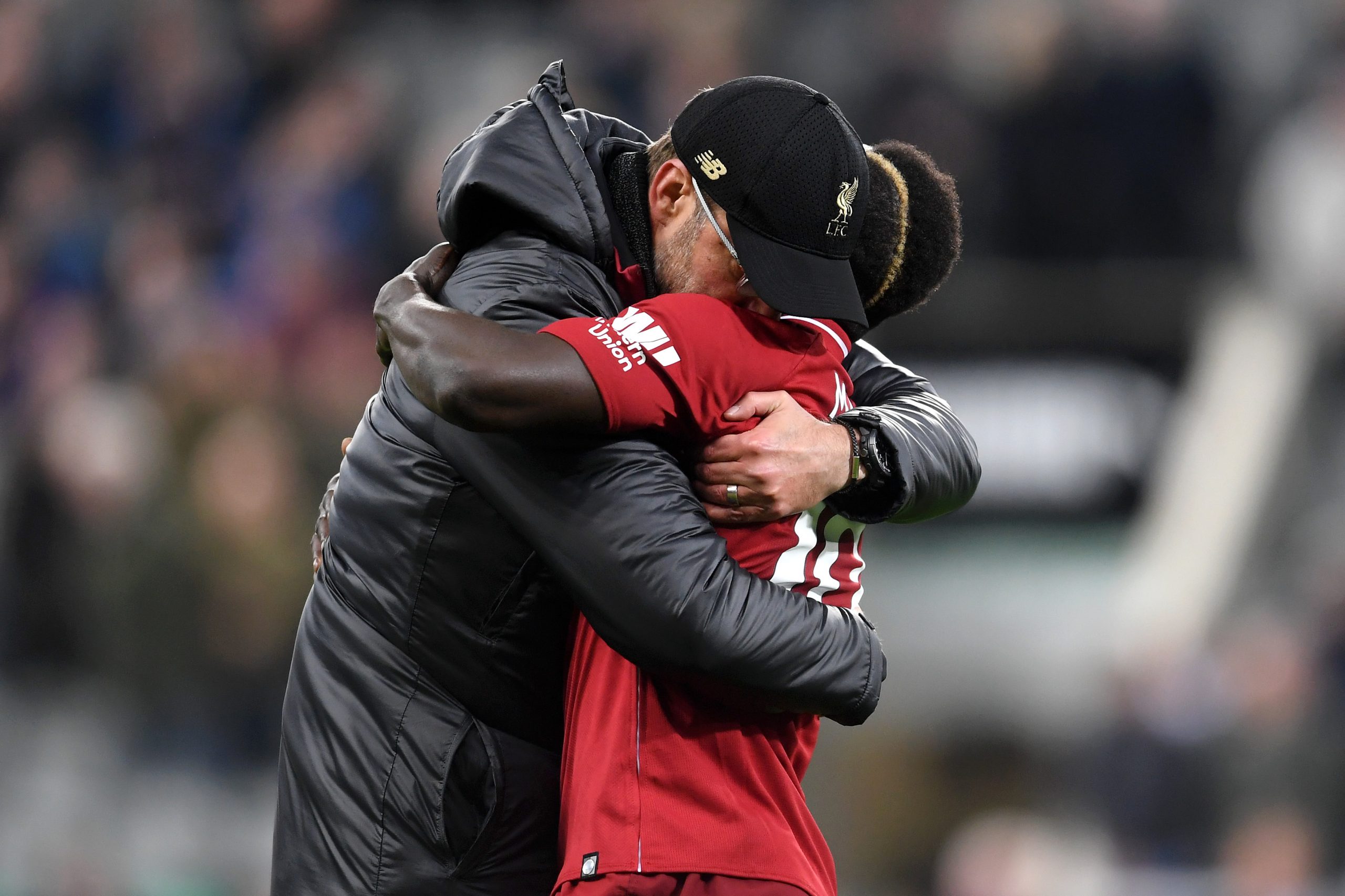 Sadio Mane receiving a trademark hug from Liverpool manager, Jurgen Klopp.