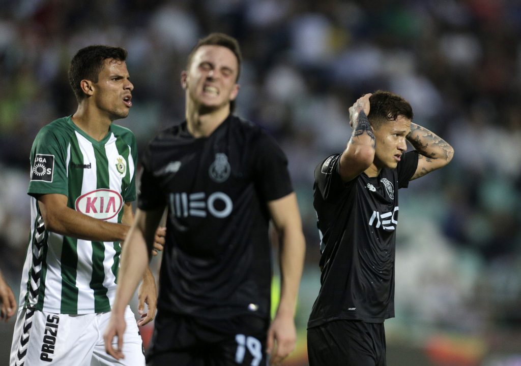 Otavio of FC Porto with Diogo Jota out of focus.