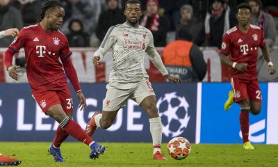 Renato Sanches (L) challenged by Georginio Wijnaldum. (Photo: ODD ANDERSEN/AFP via Getty Images)