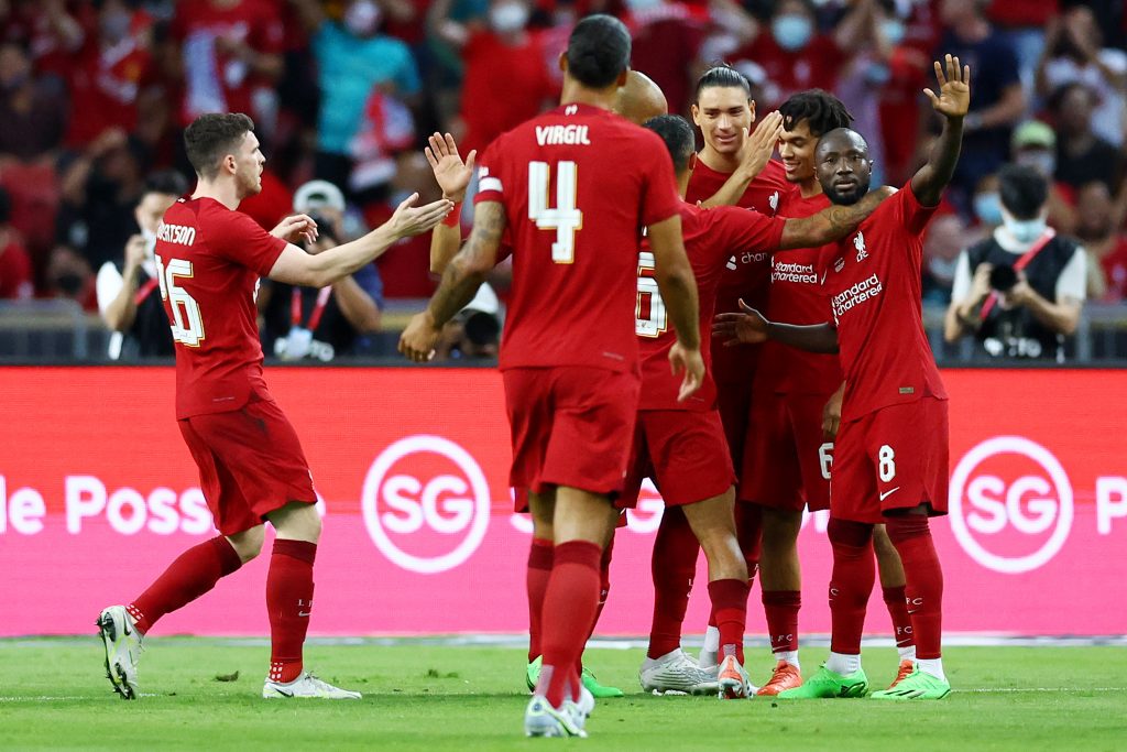 Liverpool players celebrate against Crystal Palace in a  pre-season friendly in Singapore. 