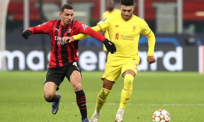 Alex Oxlade-Chamberlain of Liverpool is challenged by Ismael Bennacer of AC Milan.