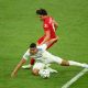 Trent Alexander-Arnold of Liverpool battles for possession with Casemiro of Real Madrid. (Photo by Matthias Hangst/Getty Images)