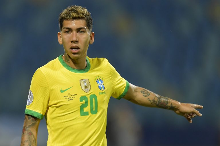 Roberto Firmino of Brazil gestures during a match against Ecuador. (Photo by Pedro Vilela/Getty Images)