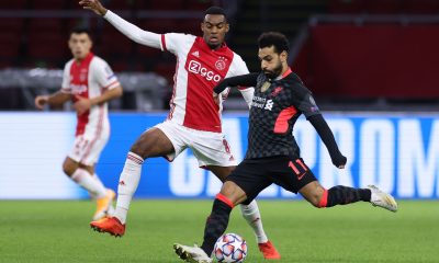 Ajax's Ryan Gravenberch vies for the ball with Liverp