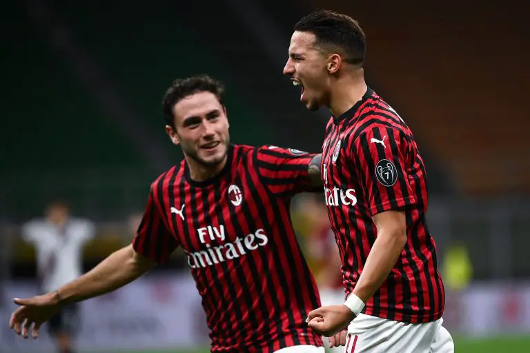 Ismael Bennacer celebrates a goal for AC Milan with Davide Calabria.