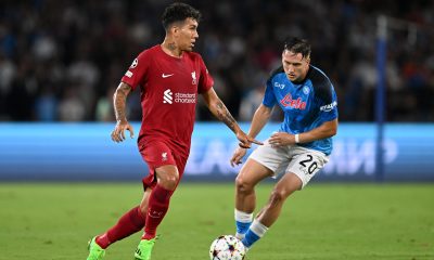 Roberto Firmino of Liverpool is put under pressure by Piotr Zielinski of SSC Napoli.