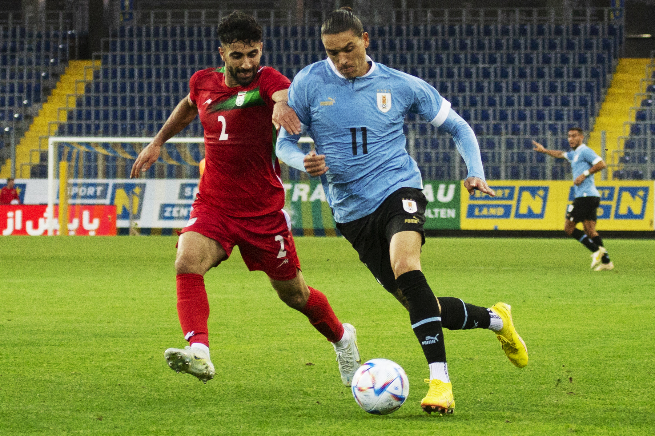 Iran's Sadegh Moharrami and Uruguay's forward Darwin Nunez vie for the ball during an international friendly.