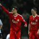 Albert Riera with Robbie Keane of Liverpool in a game against Preston North End.