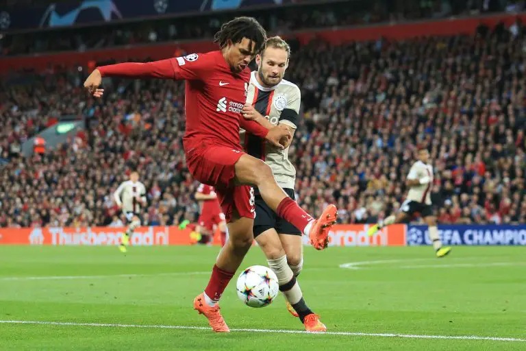 Trent Alexander-Arnold of Liverpool vies for the ball with Daley Blind of Ajax.