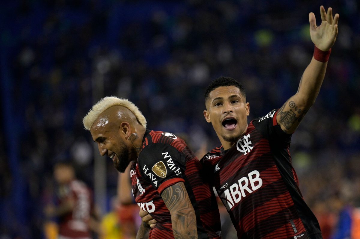 Flamengo's Arturo Vidal and teammate Joao Gomes celebrate after scoring against Velez Sarsfield. (Photo by LUIS ROBAYO/AFP via Getty Images)
