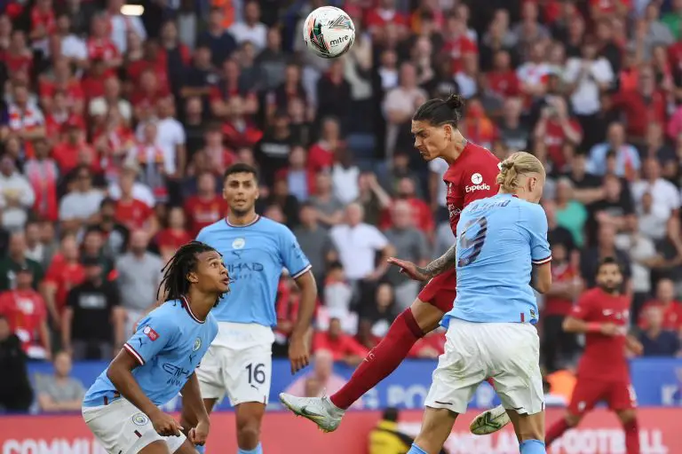 Darwin Nunez of Liverpool vies for a header with Erling Haaland of Manchester City in the FA Community Shield.