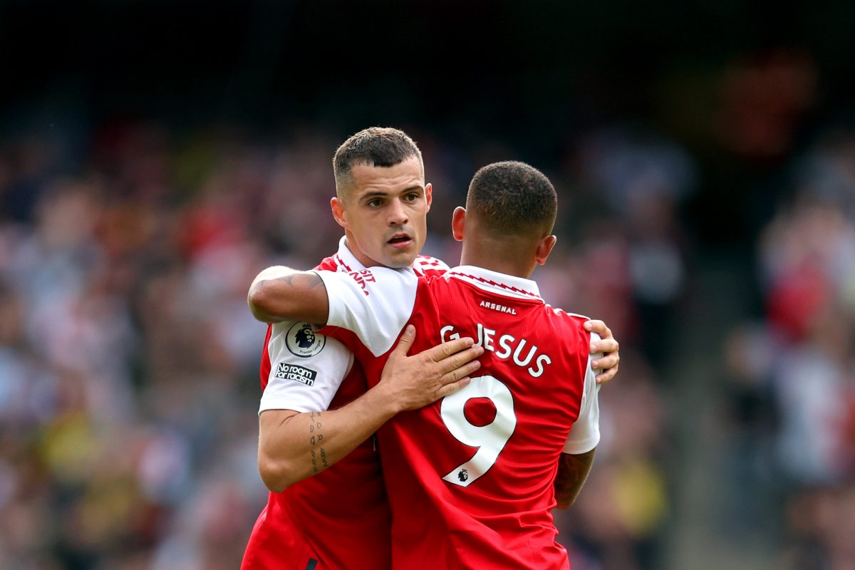 Granit Xhaka of Arsenal interacts with Gabriel Jesus of Arsenal after being substituted against Tottenham Hotspur. 