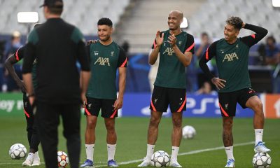 Alex Oxlade-Chamberlain with Fabinho and Roberto Firmino in Liverpool training. (Photo by PAUL ELLIS/AFP via Getty Images)
