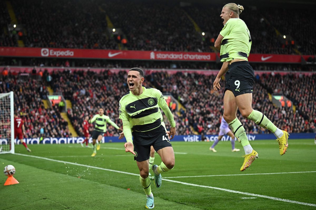 Phil Foden and Erling Haaland celebrate a goal against that was later disallowed by VAR against Liverpool.