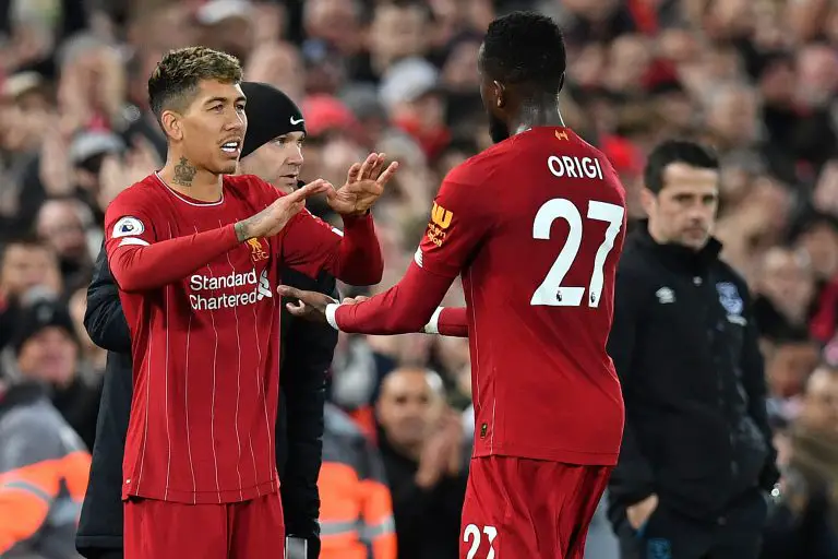 Roberto Firmino and Divock Origi during their time at Liverpool. (Photo by PAUL ELLIS/AFP via Getty Images)