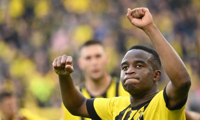 Youssoufa Moukoko celebrates scoring a goal for Borussia Dortmund.