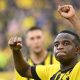 Youssoufa Moukoko celebrates scoring a goal for Borussia Dortmund.