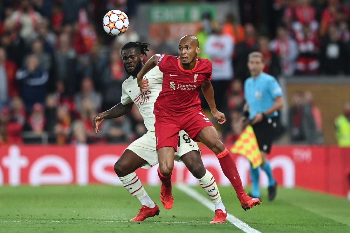 Franck Kessie of AC Milan in action against Fabinho Tavares of Liverpool during a UEFA Champions League group stage game in September 2021.