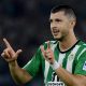Real Betis' Guido Rodriguez celebrates after scoring against AS Roma. (Photo by FILIPPO MONTEFORTE/AFP via Getty Images)