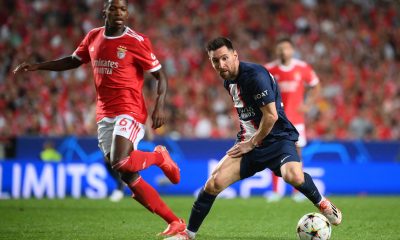 Benfica's Florentino Luis vies with Paris Saint-Germain's Lionel Messi.