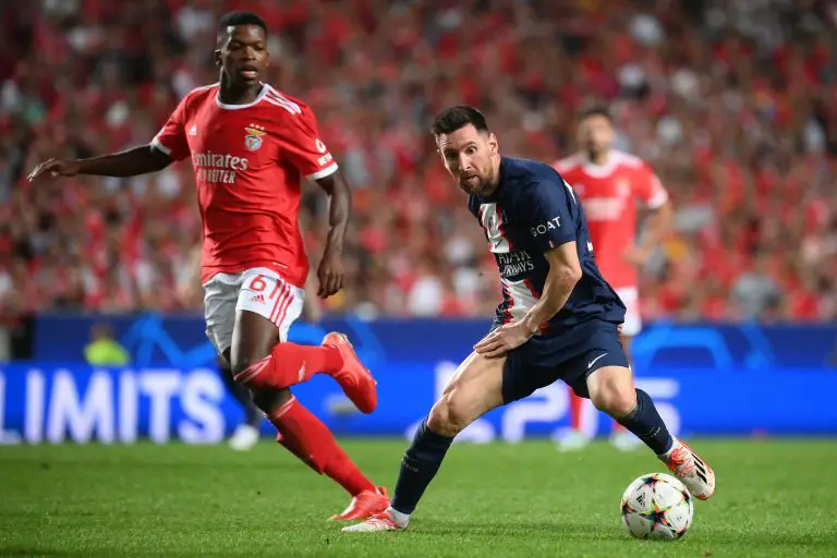 Benfica's Florentino Luis vies with Paris Saint-Germain's Lionel Messi.