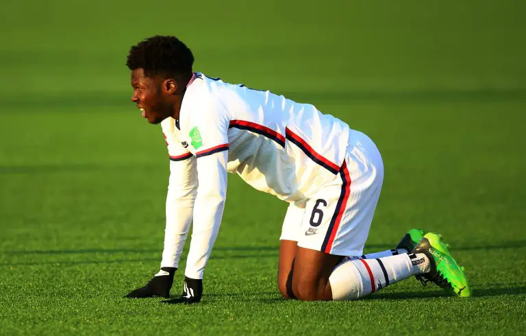 Yunus Musah of the United States looks on.